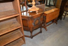 OLD CHARM CARVED OAK CANTED SIDE CABINET