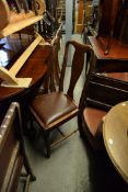 A SET OF FOUR QUEEN ANNE STYLE WALNUTWOOD DINING CHAIRS (4)