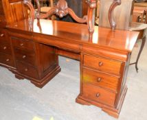 MODERN MAHOGANY PEDESTAL DRESSING TABLE WITH OGEE FRIEZE DRAWERS AND BRACKET FEET, 59" (150cm) wide