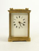 ACC, EARLY TWENTIETH CENTURY BRASS CASED CARRIAGE CLOCK, of typical form with Roman dial, heavily