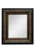 EDWARDIAN WALL MIRROR: Early 20th century stained oak and gilt framed rectangular wall mirror, 30 ¾”