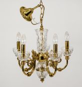 EDWARDIAN STYLE FIVE BRANCH BRASS ELECTROLIER WITH MOULDED GLASS SHADES and scroll arms, 28” (