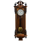 EARLY TWENTIETH CENTURY FIGURED WALNUT AND EBONISED VIENNA STYLE WALL CLOCK, with subsidiary seconds