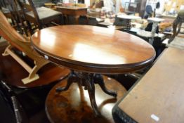 VICTORIAN MAHOGANY OVAL SNAP-TOP BREAKFAST TABLE, ON QUADRUPARTITE BIRDCAGE BASE TO PORCELAIN