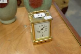 A TWENTIETH CENTURY BRASS CASED CARRIAGE CLOCK