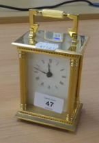 WILLIAM WIDDOP HEAVY GILT BRASS CARRIAGE CLOCK, BATTERY OPERATED