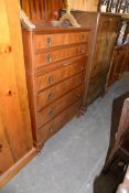 AN EARLY TWO MID-TWENTIETH CENTURY TALL CHEST OF SIX GRADUATED DRAWERS