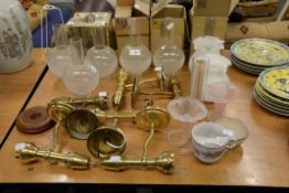 A SELECTION OF OIL LAMP SHADES AND SIX BRASS SCONCES