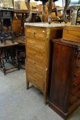 A TWENTIETH CENTURY FRENCH SIX DRAWER MARBLE TOP CHEST, TOGETHER WITH AN INSET MARBLE TOPPED