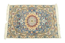 TABRIZ, PERSIAN, RUG with petal shaped circular white medallion with pendant, on a sky blue and