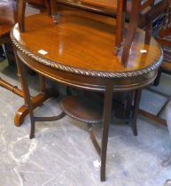 A MAHOGANY OVAL OCCASIONAL TABLE WITH UNDER-TIER