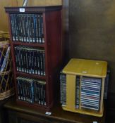 A MAHOGANY SMALL FLOOR STANDING OPEN RACK CONTAINING A QUANTITY OF ‘TALKING BOOKS’ AND A SELECTION