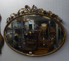 A 20TH CENTURY GILT-FRAMED MIRROR WITH RIBBON CARTOUCHE