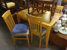 A SOLID BEECHWOOD RECTANGULAR DINING TABLE AND FOUR MATCHING DINING CHAIRS (5)