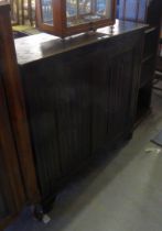 17TH CENTURY STYLE OAK DWARF CUPBOARD ENCLOSED BY TWO PANEL DOORS