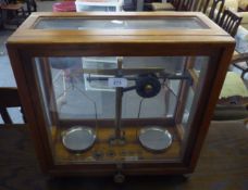 CHEMICAL BALANCE SCALES, IN OAK AND GLAZED CASE, WITH A SET OF BRASS WEIGHTS