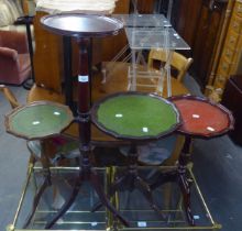 THREE TRIPOD WINE TABLES WITH COLOURED LEATHER INSET TOPS AND A TRIPOD JARDINIERE STAND (4)