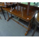 A MAHOGANY SIDE TABLE WITH TWIN PILLAR SUPPORTS TO BOTH ENDS