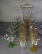 FIVE GREEN STEM MARTINI GLASSES, TWO SHERRY GLASSES AND A GILT DECORATED LEMONADE SET