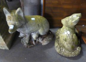 TWO GARDEN CONCRETE ANIMALS, VIZ A RABBIT AND A FOX 14" HIGH (FOX)