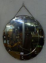 A CIRCULAR FRAMELESS WALL MIRROR, A GILT FRAMED OBLONG WALL MIRROR, HAVING CANTED CORNERS, TWO