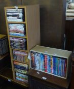 A BLOND WOOD FIVE TIER DVD AND 40 DVDS, INCLUDING SETS SUCH AS ‘THE GREAT WAR’ (6) AND ‘THE WORLD AT