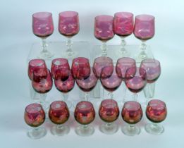 CRANBERRY GLASS, Part suite of cranberry flash stemware with lapidary cut floral sprays [22]