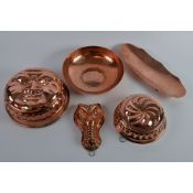 TWO LAKELAND RURAL INDUSTRIES BORROWDALE PLANISHED COPPER DISHES, one of shaped oval form with three