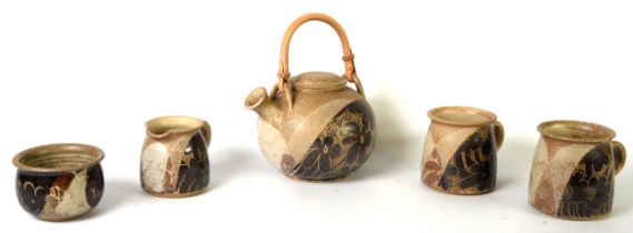 CRICH POTTERY FIVE PIECE STUDIO POTTERY TEA SET FOR TWO PERSONS, comprising: CANE HANDLED TEAPOT,