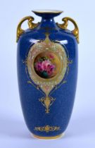 EARLY TWENTIETH CENTURY FLORAL PAINTED ROYAL WORCESTER TWO HANDLED POWDER BLUE PORCELAIN VASE BY