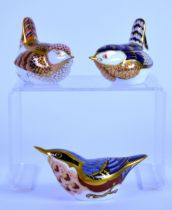 ROYAL CROWN DERBY: THREE PAPERWEIGHTS, modelled as wrens in two colourways and a nuthatch
