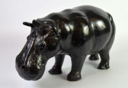 LIBERTY’S STYLE MODERN BLACK LEATHER COVERED MODEL OF A HIPPOPOTAMUS, 10 ½” (26.7cm) high, 18” (45.