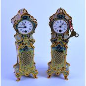 PAIR OF MODERN CLOISONNE OR CHAMPLEVE STYLE PAINTED GILT METAL MANTLE CLOCKS, each with 2” Roman