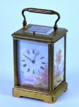 EARLY TWENTIETH CENTIRY BRASS AND HAND PAINTED PORCELAIN REPEATING CARRIAGE CLOCK WITH RED MOROCCO