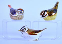 ROYAL CROWN DERBY: THREE PAPERWEIGHTS modelled as a crested tit, a goldcrest and a blue tit (3)