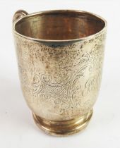 GEORGE V SILVER CHRISTENING MUG, of footed form with loop handle, engraved with scroll work and