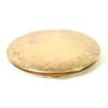 GOLD PLATED CIRCUAR POWDER COMPACT, engine turned with foliate scroll engraved broad border and