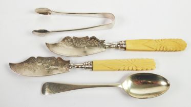 TWO WILLIAM IV SILVER BUTTER KNIVES with foliate engraved blades and carved bone handles, Birmingham