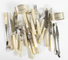 GEORGE V SET OF TEN PAIRS OF SILVER BLADED FRUIT KNIVES AND FORKS WITH MOTHER OF PEARL HANDLES,