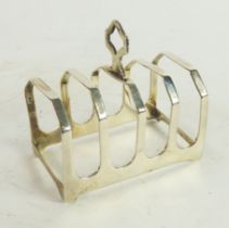 GEORGE VI SILVER BACHELOR’S FOUR DIVISION TOAST RACK BY EDWARD VINER, with canted divisions and