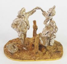 MAPPIN & WEBB PARCEL GILT SILVER FIGURAL GROUP depicting a gallant helping a crinolined lady climb