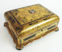 VICTORIAN BLACK LACQUERED AND ELABORATELY GILT DECORATED JEWELLERY CASKET with engraved mother of