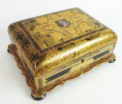 VICTORIAN BLACK LACQUERED AND ELABORATELY GILT DECORATED JEWELLERY CASKET with engraved mother of