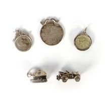 THREE SILVER CHARMS, namely a vintage car; cottage (hinge-opening); the three wise monkeys and THREE