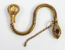 VICTORIAN GOLD PLATED ARTICULATED BRACELET in the form of a snake, the head set with red and white