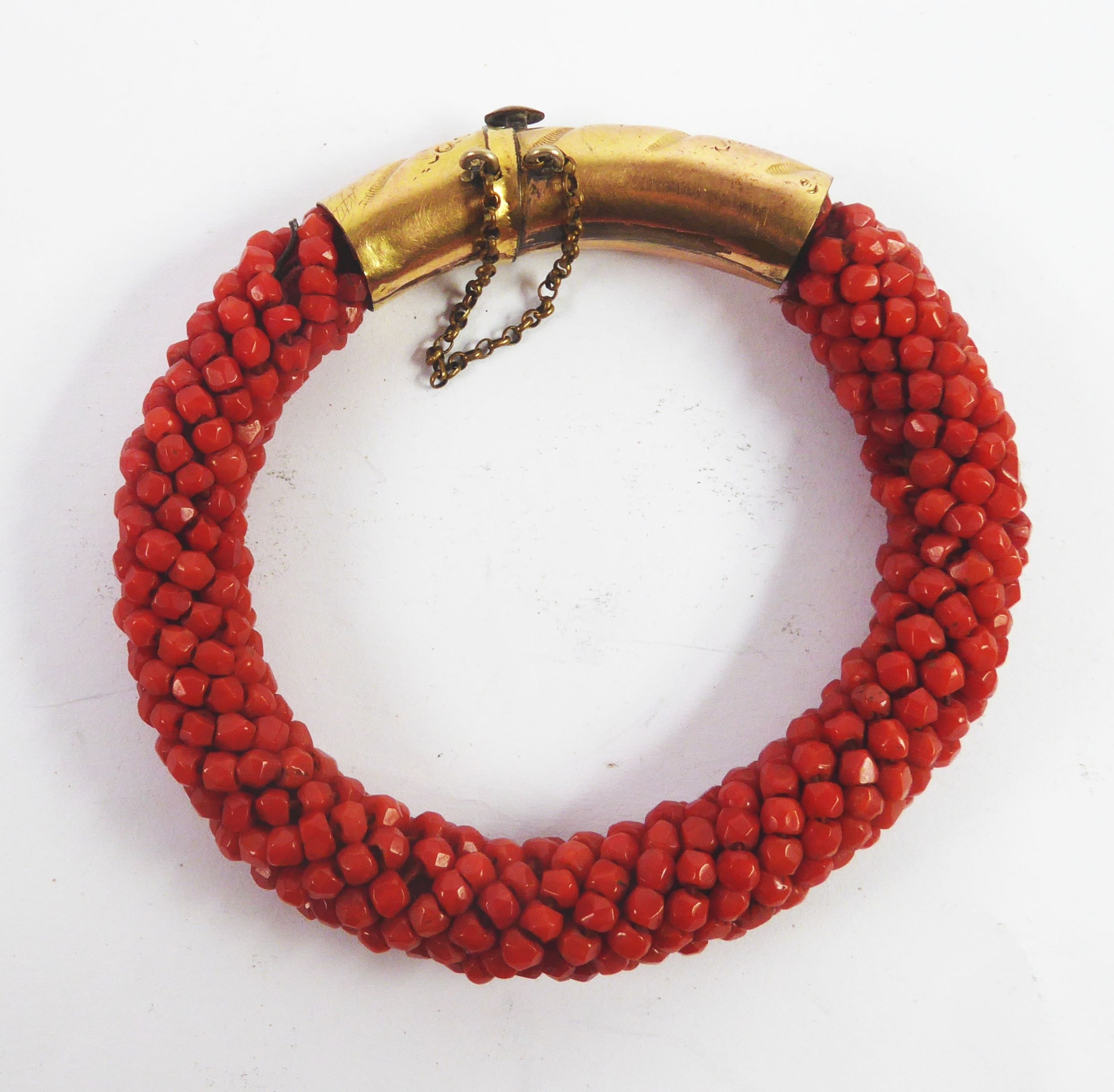 VICTORIAN BRACELET OF MULTIPLE RED CORAL BEADS, with gold plated cylindrican clasp engraved and - Image 2 of 2