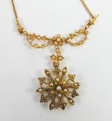 EDWARDIAN 15ct GOLD FINE CHAIN NECKLACE, the fixed pendant front in the form of floral and foliate