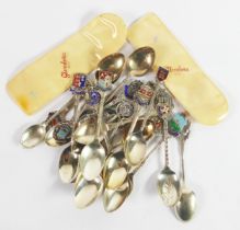 SEVENTEEN SILVER SOUVENIR TEEASPOONS WITH ENAMEL TOPS, together with THREE OTHER SILVER SOUVENIR