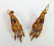 PAIR OF VICTORIAN GOLD PLATED SCROLL PATTERN DROP EARRINGS, each set with an amethyst and two