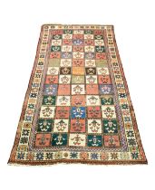 BAKHTIARI, WEST PERSIAN, SMALL CARPET WITH ALL-OVER TILE PATTERN in white and various colours,